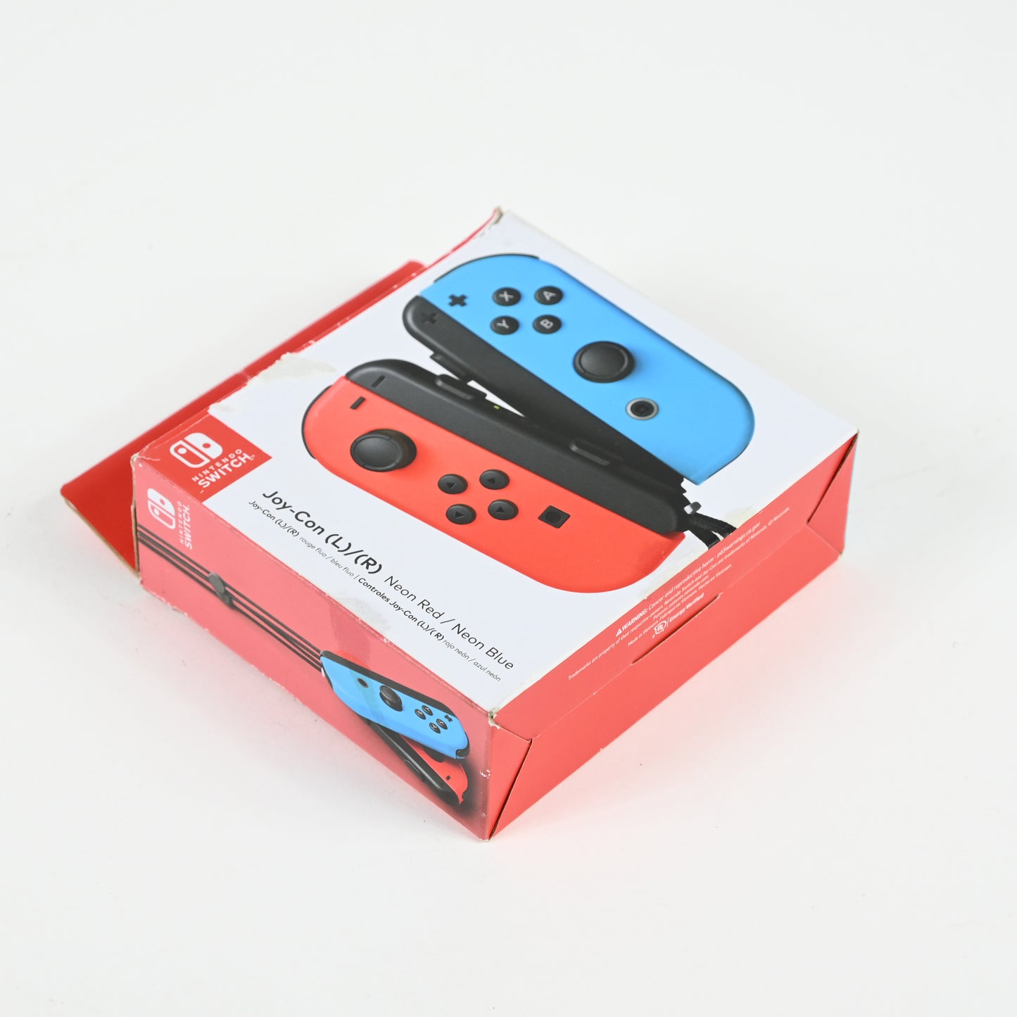 Nintendo Switch Joy-Cons (L/R) - Neon Red/Neon Blue - Includes Caps